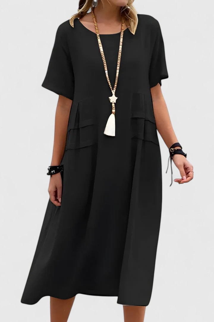 Amara | Loose Short-Sleeve midi pocket Dress Olivia & Kendall New York